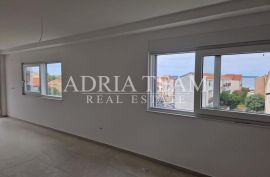 APARTMANI U STAMBENIM ZGRADAMA, NOVOGRADNJA, 150 m OD MORA - PRIVLAKA, Privlaka, شقة