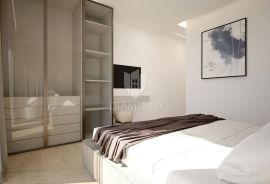 Atraktivan novi stan sa okućnicom na korak do centra Rovinja, Rovinj, Apartamento