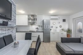 ISTRA, NOVIGRAD - Stan u visokom prizemlju sa vrtom, Novigrad, Wohnung