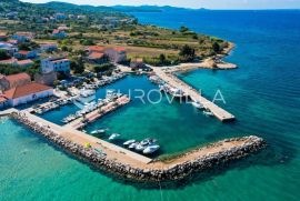 Otok Pašman, Dobropoljana, građevinsko zemljište 1.058 m2, Pašman, Земля