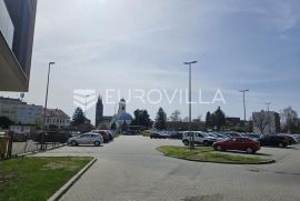 Đakovo, strogi centar, poslovni prostor u novoizgrađenoj zgradi, 140 m2 ili 2 x 70 m2, Đakovo, Ticari emlak