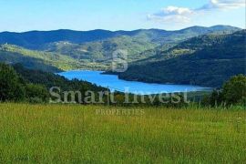 MOTOVUN, VRH, GRAĐ. ZEMLJIŠTE S POGLEDOM NA BUTONIGU 2134 M2, Motovun, Land