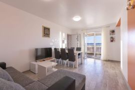 APARTMAN UZ MORE S PREDIVNIM POGLEDOM RIBARICA, Karlobag, شقة