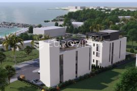 Zadar, Sukošan, prekrasan penthouse s krovnom terasom prvi red uz more, NKP 249,10 m2, Sukošan, Daire