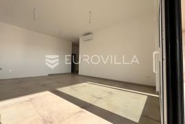 Istra, Banjole - trosoban stan u novogradnji, drugi kat, garaža, 120 m2 s otvorenim pogledom na more, Medulin, Appartement