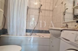 Crikvenica, stan u prizemlju sa velikom okućnicom, Crikvenica, Appartement