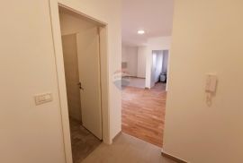 Lovran, stan 60m2, novogradnja, 2 kat, balkon, parking, Lovran, Kвартира