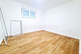 KRASAN STAN U SUTERENU NOVOGRADNJE, Crikvenica, Appartement