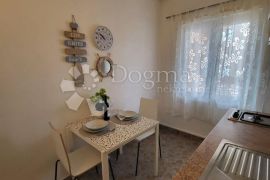 PRIMOSTEN-APARTMANSKA KUĆA S POGLEDOM, Primošten, Famiglia