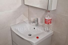 OTOK PAG, MANDRE apartman u novogradnji 2s+db s pogledom na more, Kolan, Appartamento