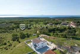 Istra, Krnica - moderna samostojeća kuća s bazenom i pogledom na more, NKP 200 m2, Marčana, Ev